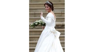 TOPSHOT - Britain's Princess Eugenie of York arrives at the West Door of St George's Chapel, Windsor Castle, in Windsor, on October 12, 2018 for her wedding to Jack Brooksbank. (Photo by Steve Parsons / POOL / AFP) (Photo credit should read STEVE PARSONS/AFP via Getty Images)