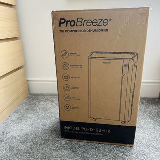 Pro Breeze 20L Premium Dehumidifier with Special Laundry Mode being tested in a carpeted room
