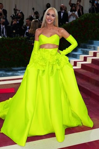 Gwen Stefani wearing a neon green gown at the met gala
