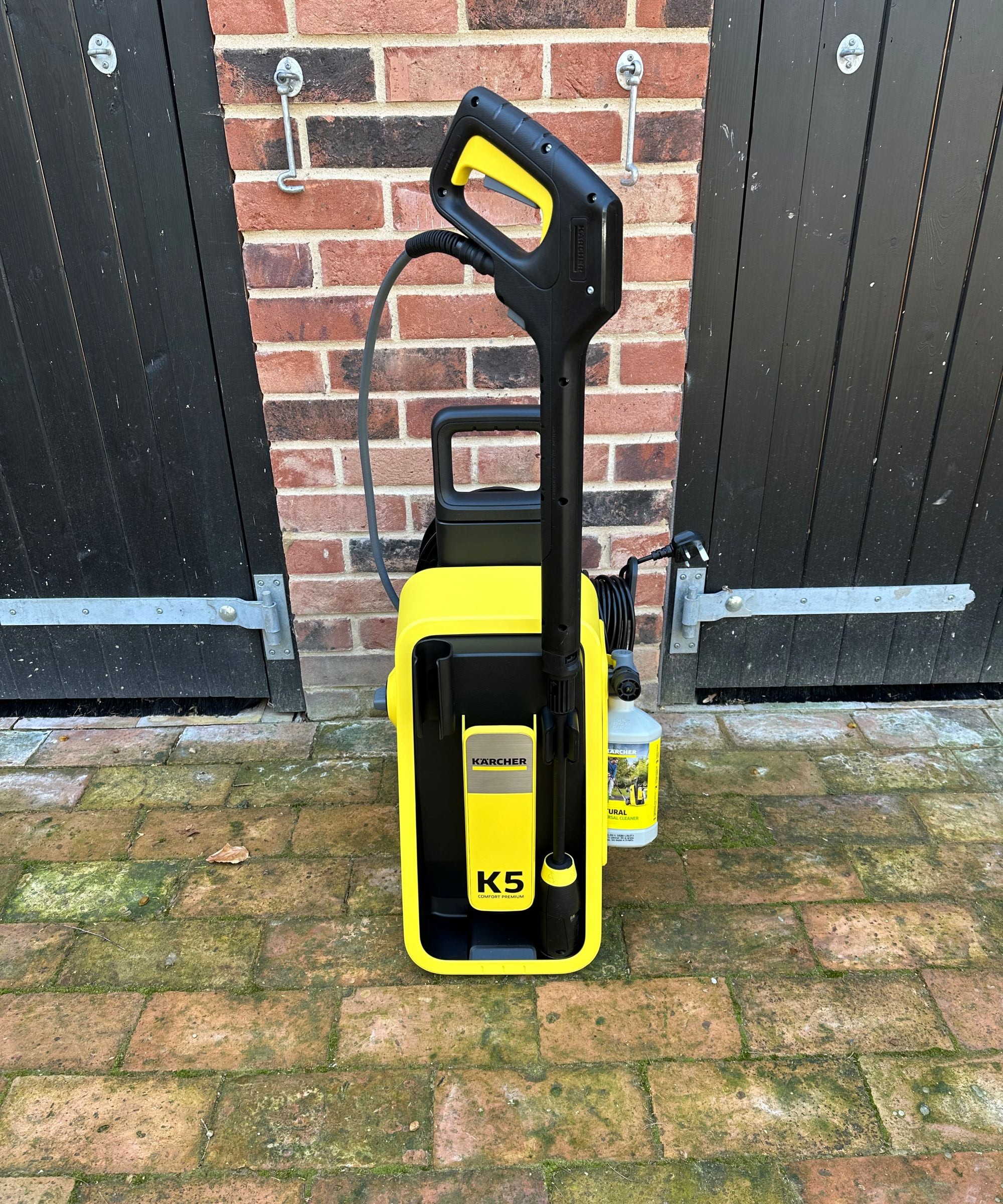 A yellow Karcher K5 comfort premium pressure washer after unboxing and assembling