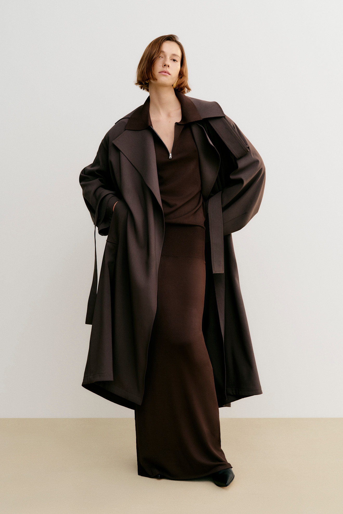 A model wore a brown wrap coat in the Brandon Maxwell Resort 2026 line
