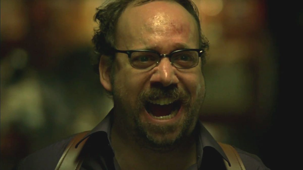 Paul Giamatti in the middle of a fit of manic laughter in Shoot &#039;em Up.