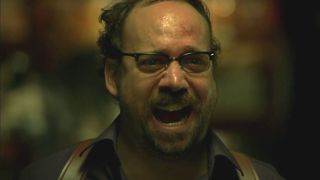 Paul Giamatti in the middle of a fit of manic laughter in Shoot 'em Up.