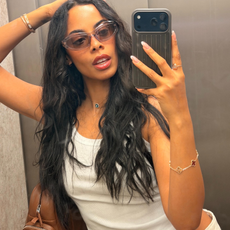 Rochelle Humes taking a mirror selfie with wavy hair
