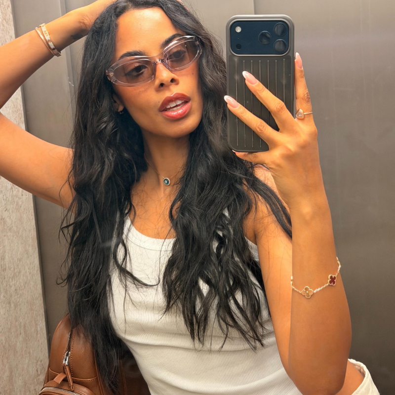 Rochelle Humes taking a mirror selfie with wavy hair