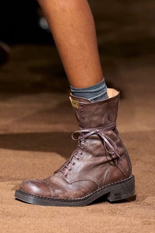 Combat boots on Miu Miu runway