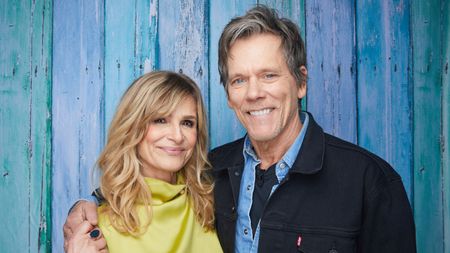 Kevin Bacon and Kyra Sedgwick on a blue background