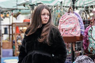 Stacey Slater is in the market looking anxious