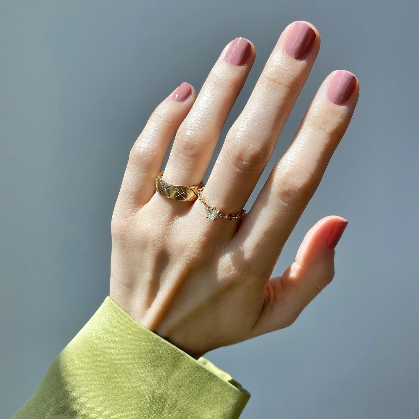 A short, square mauve manicure