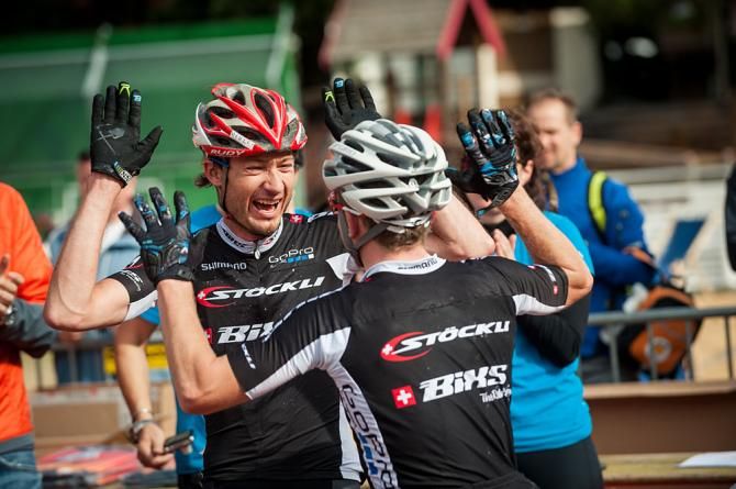 Lukas Buchli and Mathias Fl&uuml;ckiger celebrate winning the Swiss Epic