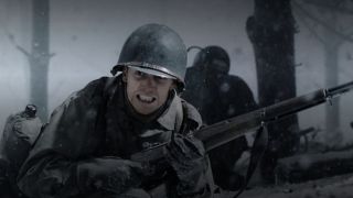 A soldier in combat in Band of Brothers