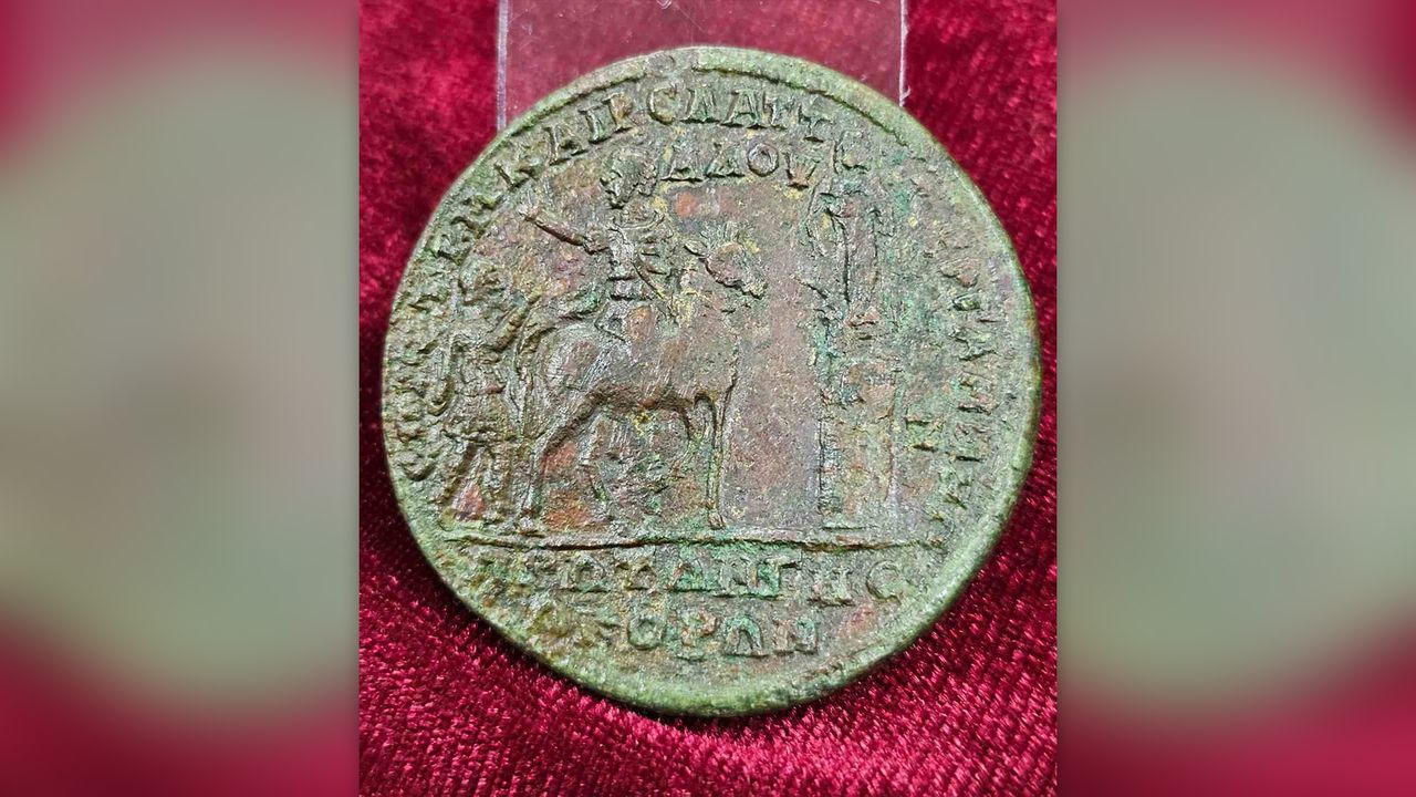The back of the bronze medallion.