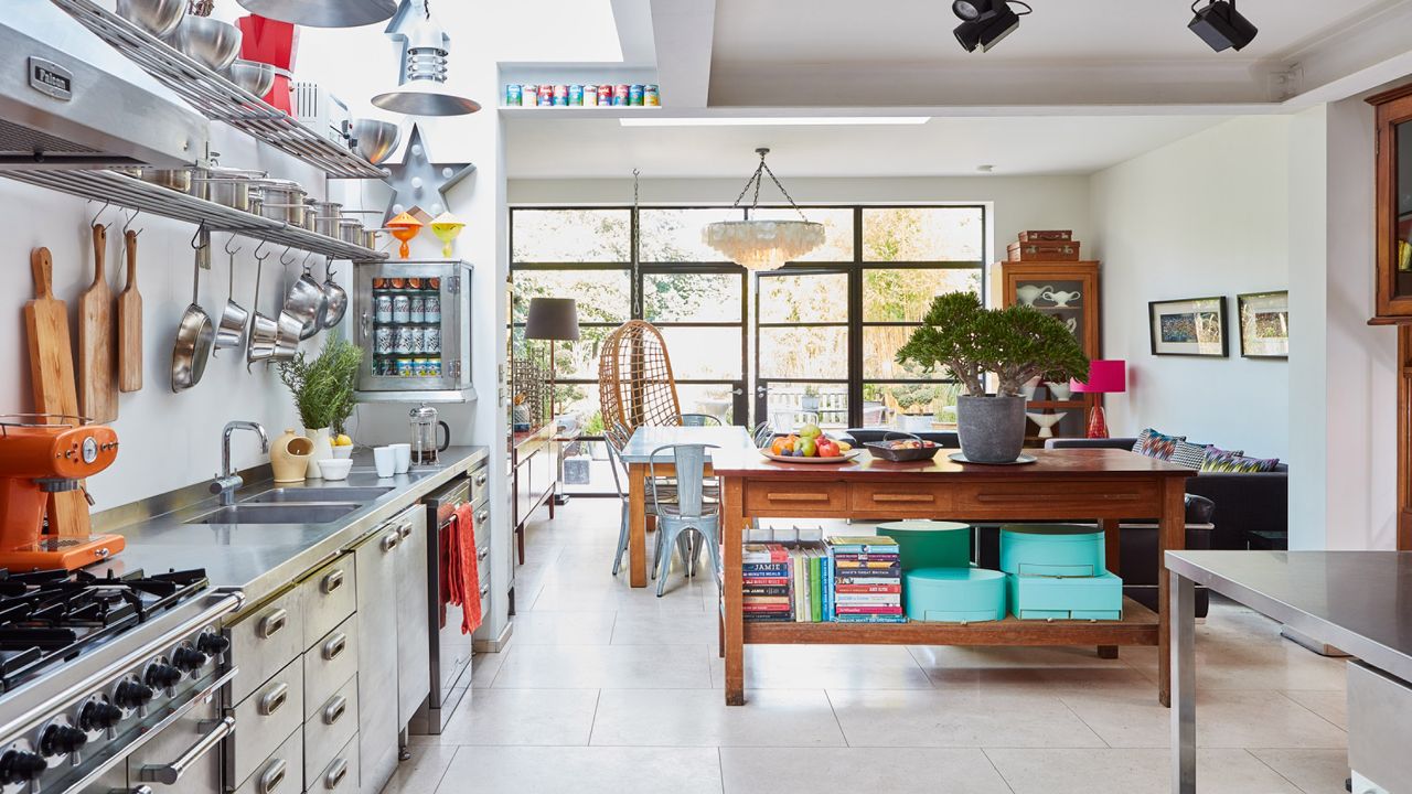 open plan modern kitchen diner with industrial pieces and Crittal glazing