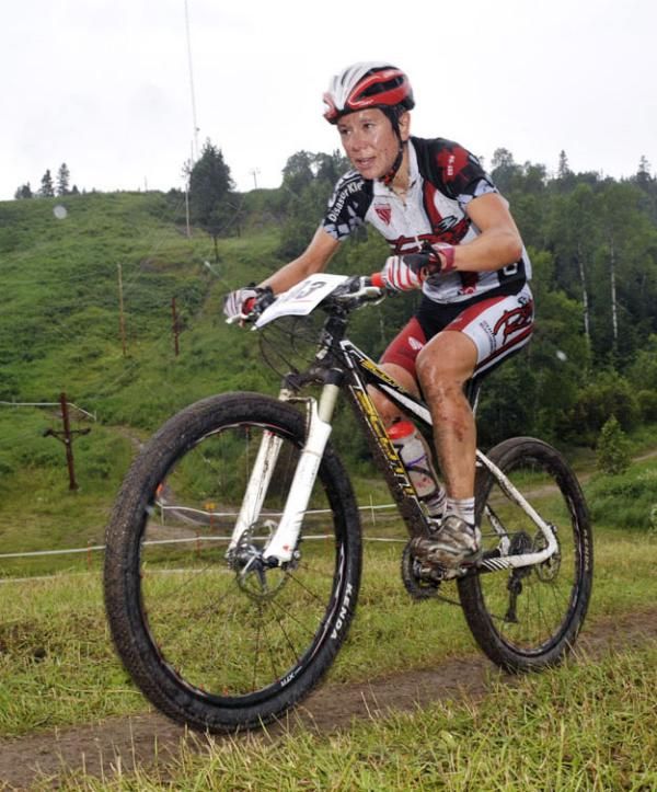 Amanda Sin (3 Rox Racing) riding back in third place.