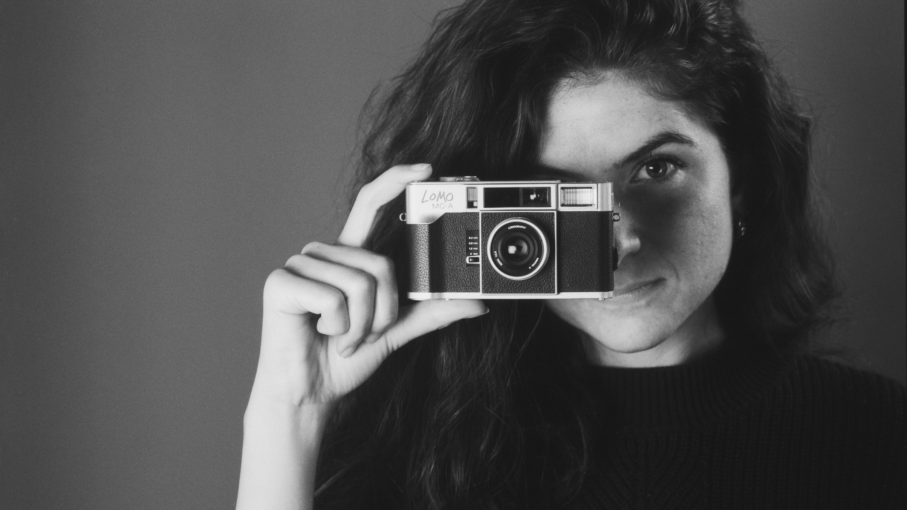 The Lomography Lomo MC-A in a photographer's hand