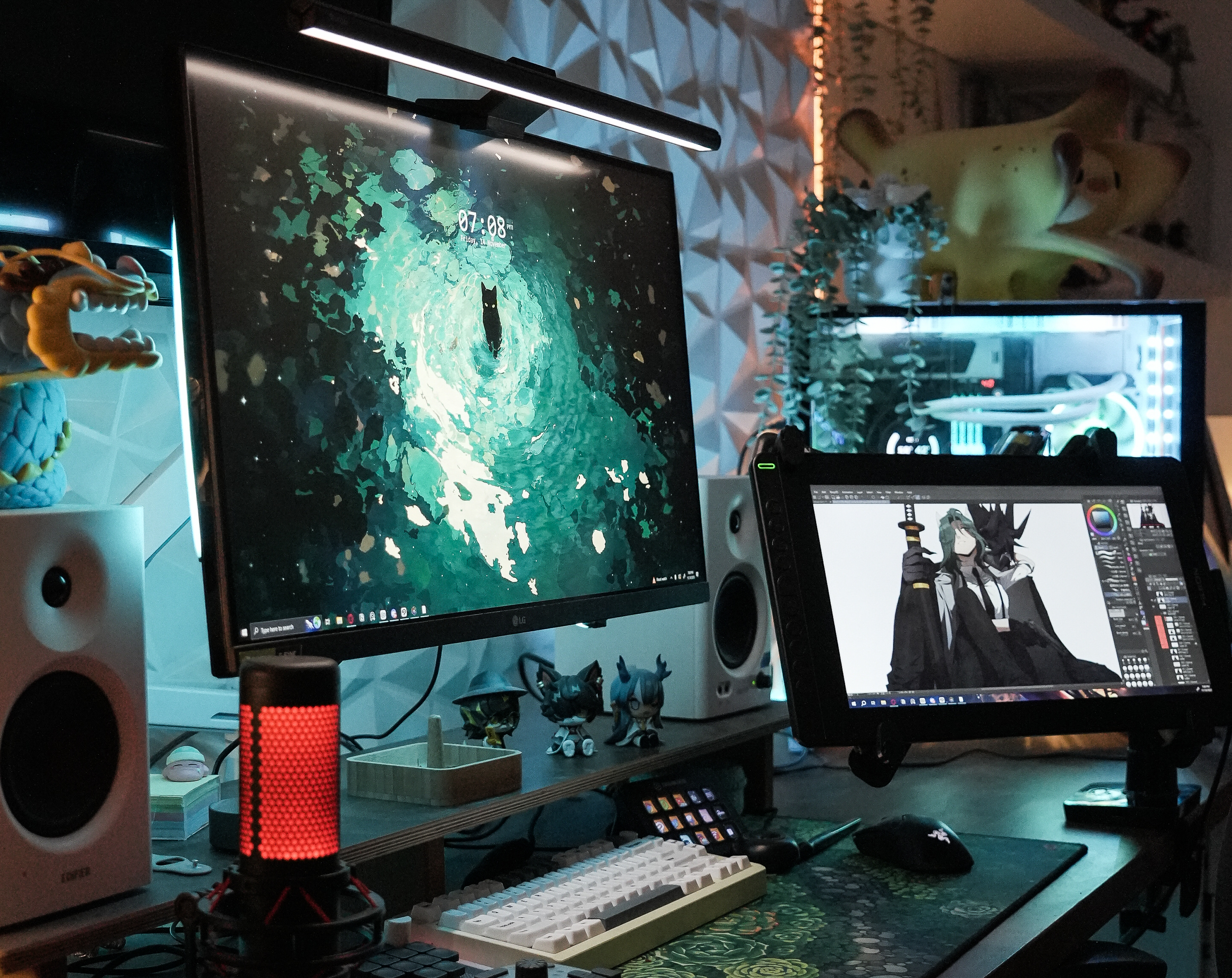 drawing tablets; an artist's desk with drawing tablet and monitor