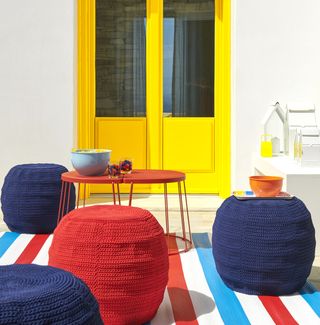 Colorful outdoor space with color blocking furniture