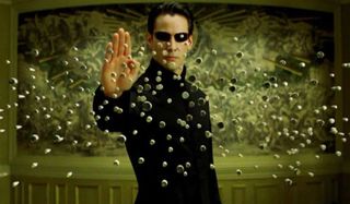 The Matrix Reloaded Neo stopping bullets in front of his face