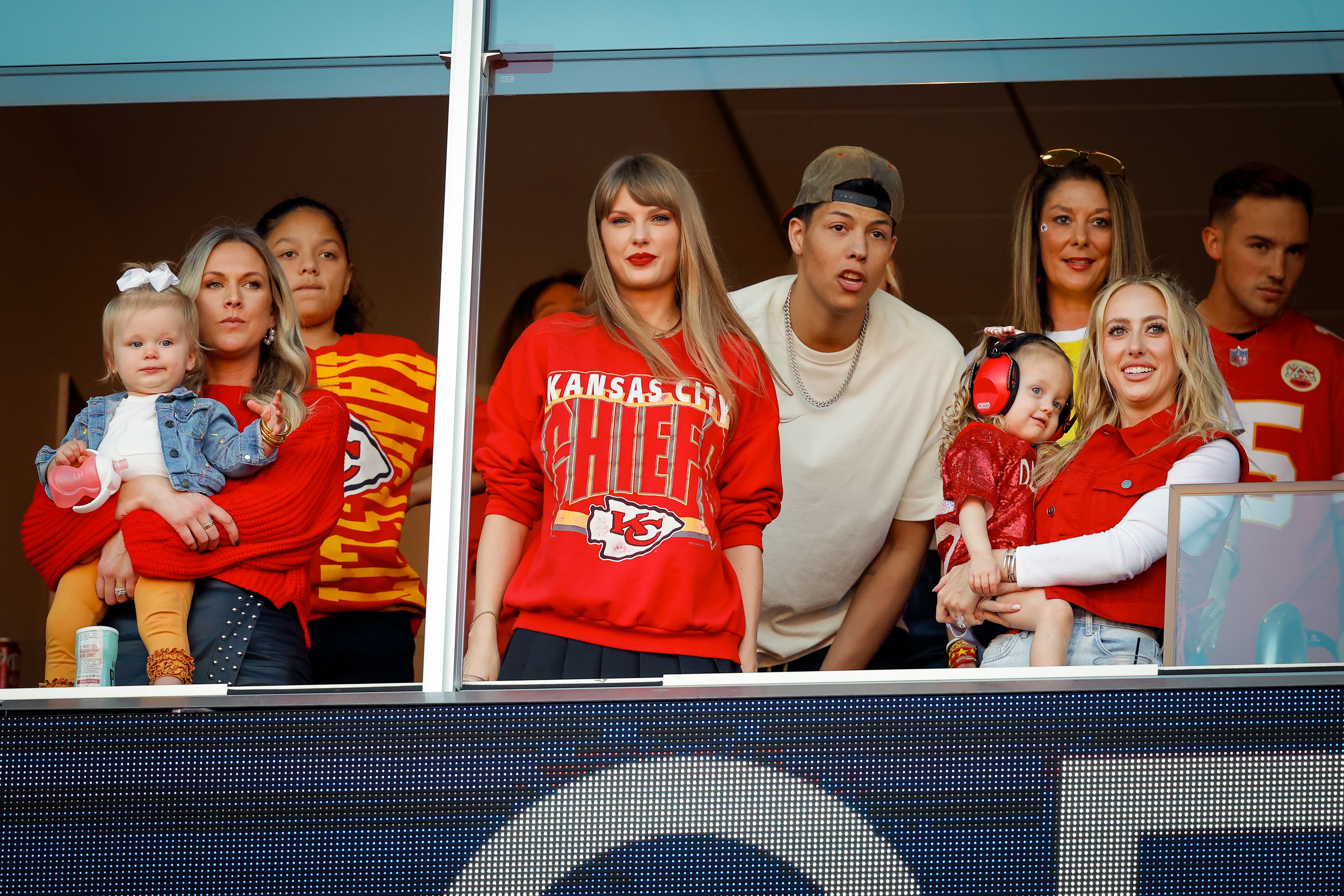 Taylor Swift attends the Kansas City Chiefs football game wearing vintage Chiefs gear