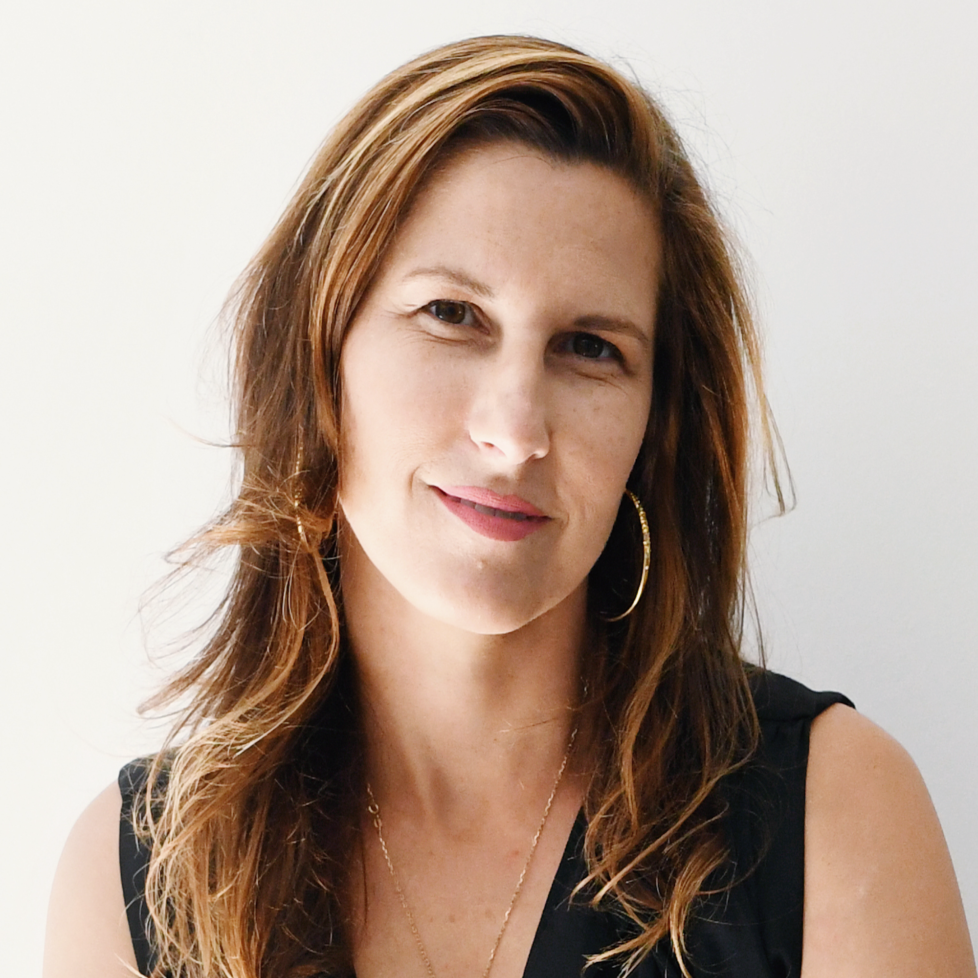 A headshot of Lucie Ayres