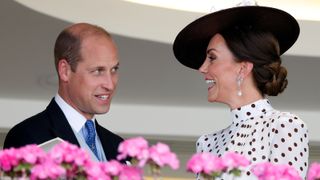 Prince William, Duke of Cambridge and Catherine, Duchess of Cambridge watch the racing from the Royal Box as they attend day 4 of Royal Ascot at Ascot Racecourse on June 17, 2022 in Ascot, England.