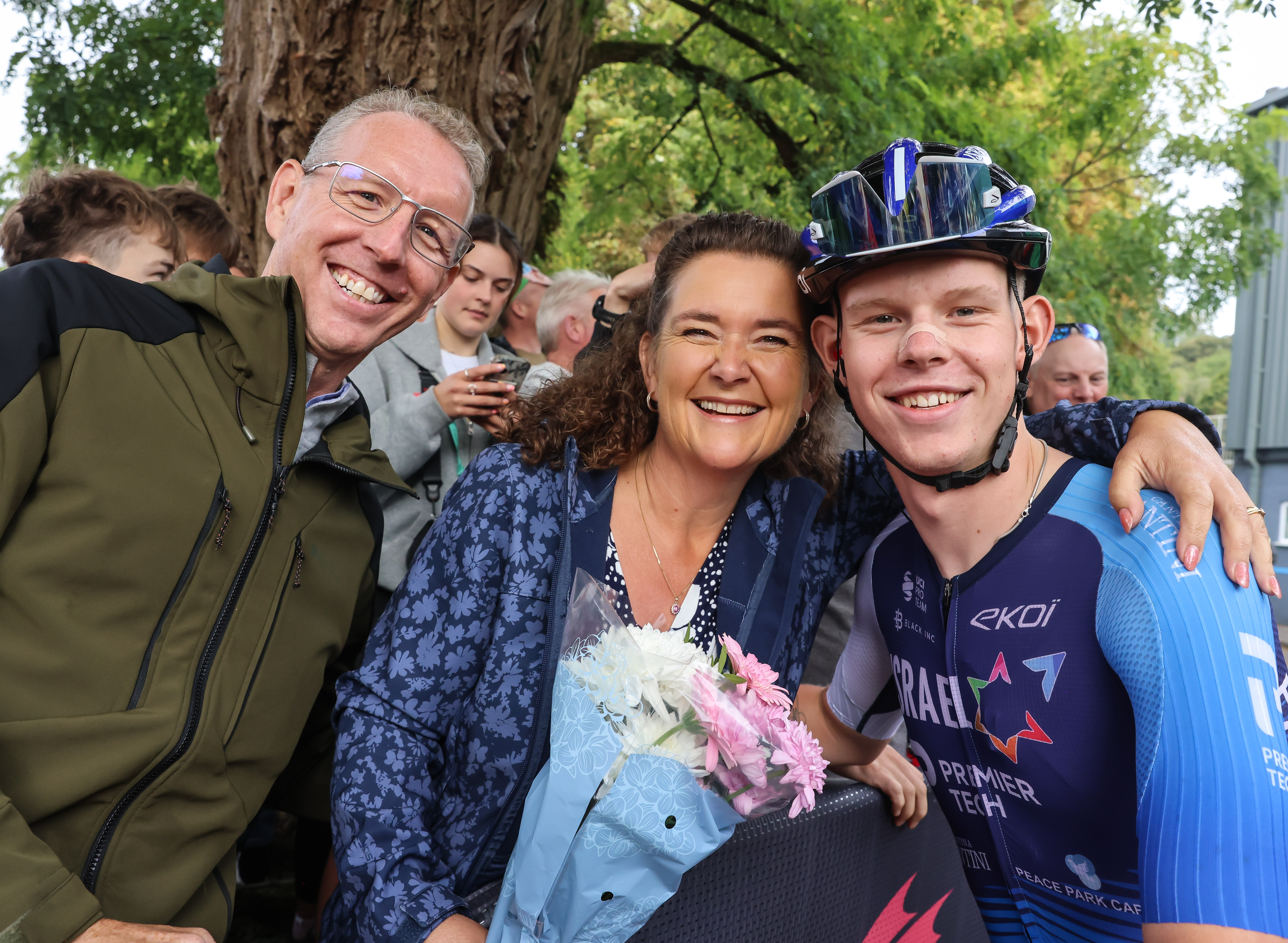 Finlay Tarling presents his mother with a bunch of flowers for the support she has given him ahead of stage 5 of the Tour of Great Britain