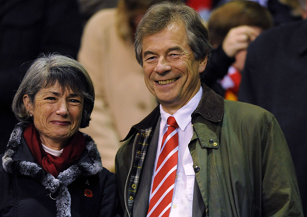 Liverpool Chairman Martin Broughton and his wife attend the Barclays Premier League match between Liverpool and West Ham United at Anfield on November 20, 2010 in Liverpool, England.