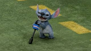 Stitch speaks into a microphone as he crashes the Super Bowl in Lilo and Stitch.