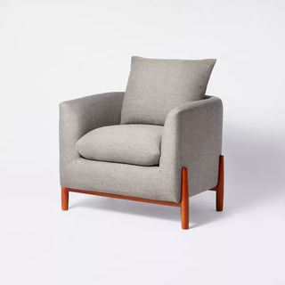 gray accent chair with wooden legs