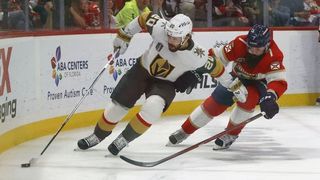 Golden Knights and Panthers players fight for the puck on a sharp turn