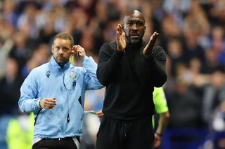 SHEFFIELD, ENGLAND - MAY 18: Darren Moore, Manager of Sheffield Wednesday applauds his team during the Sky Bet League One Play-Off Semi-Final Second Leg match between Sheffield Wednesday and Peterborough United at Hillsborough on May 18, 2023 in Sheffield, England. (Photo by Matt McNulty/Getty Images)