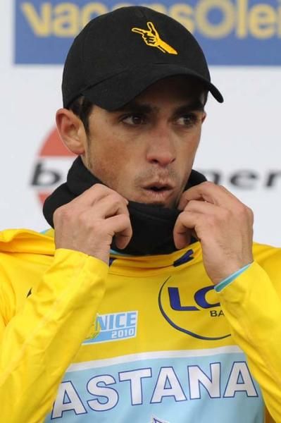 Alberto Contador kept his neck warm with a thick scarf even after he took the yellow jersey.