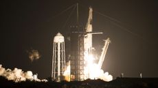 A SpaceX Falcon 9 rocket and Crew Dragon spacecraft lift off for the Crew-1 mission to the International Space Station.