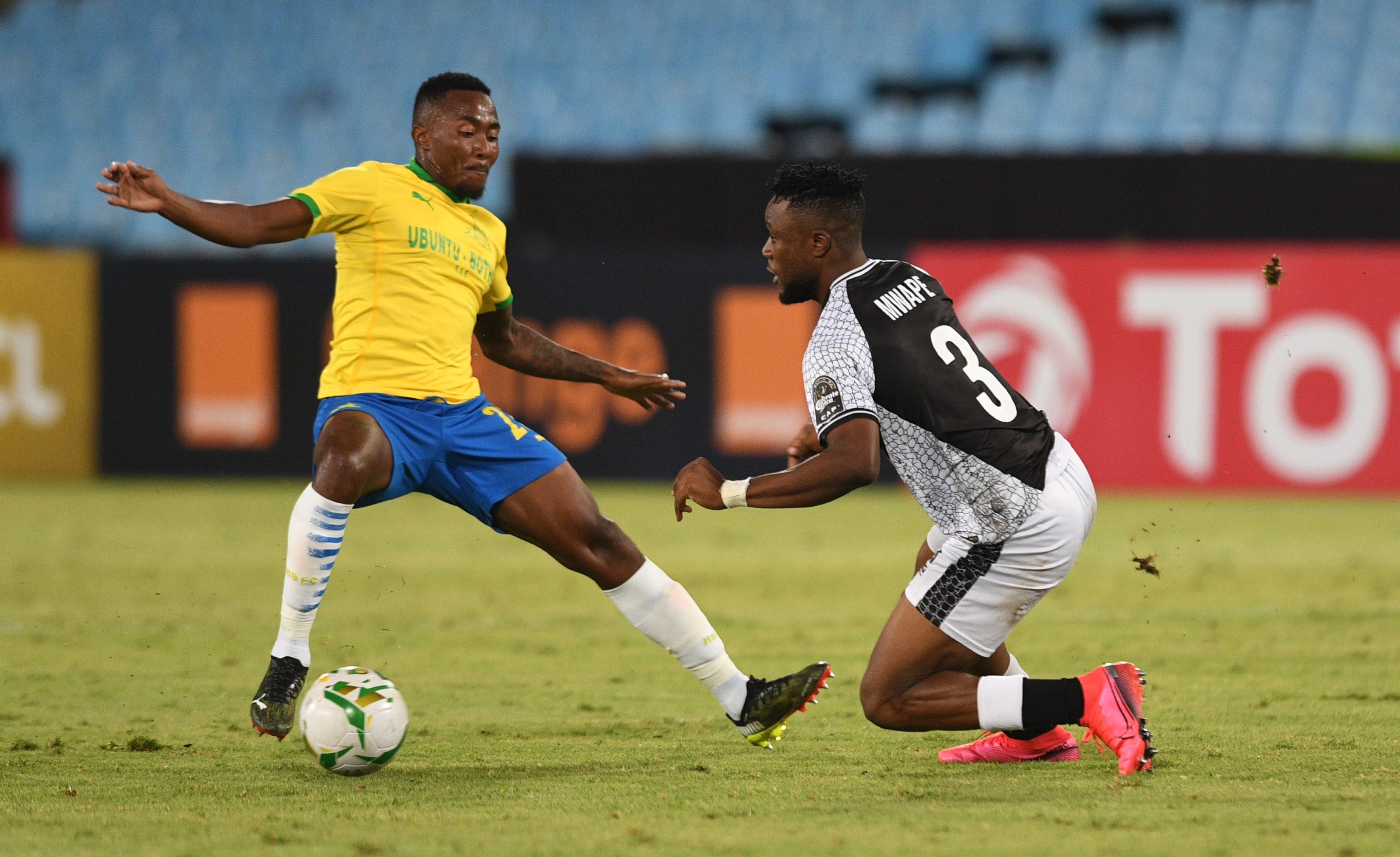 Lebohang Maboe of Mamelodi Sundowns challenged by Tandi Mwape of TP Mazembe