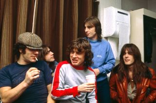 AC/DC, November 12, 1980: (l-r) Brian Johnson, Malcolm Young, Angus Young, Phil Rudd and Cliff Williams backstage at Hammersmith Odeon, London on the Back In Black Tour