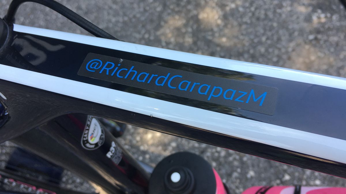 Movistar riders have their social media handles on their bikes
