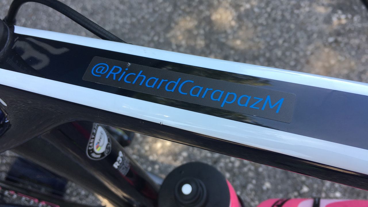 Movistar riders have their social media handles on their bikes