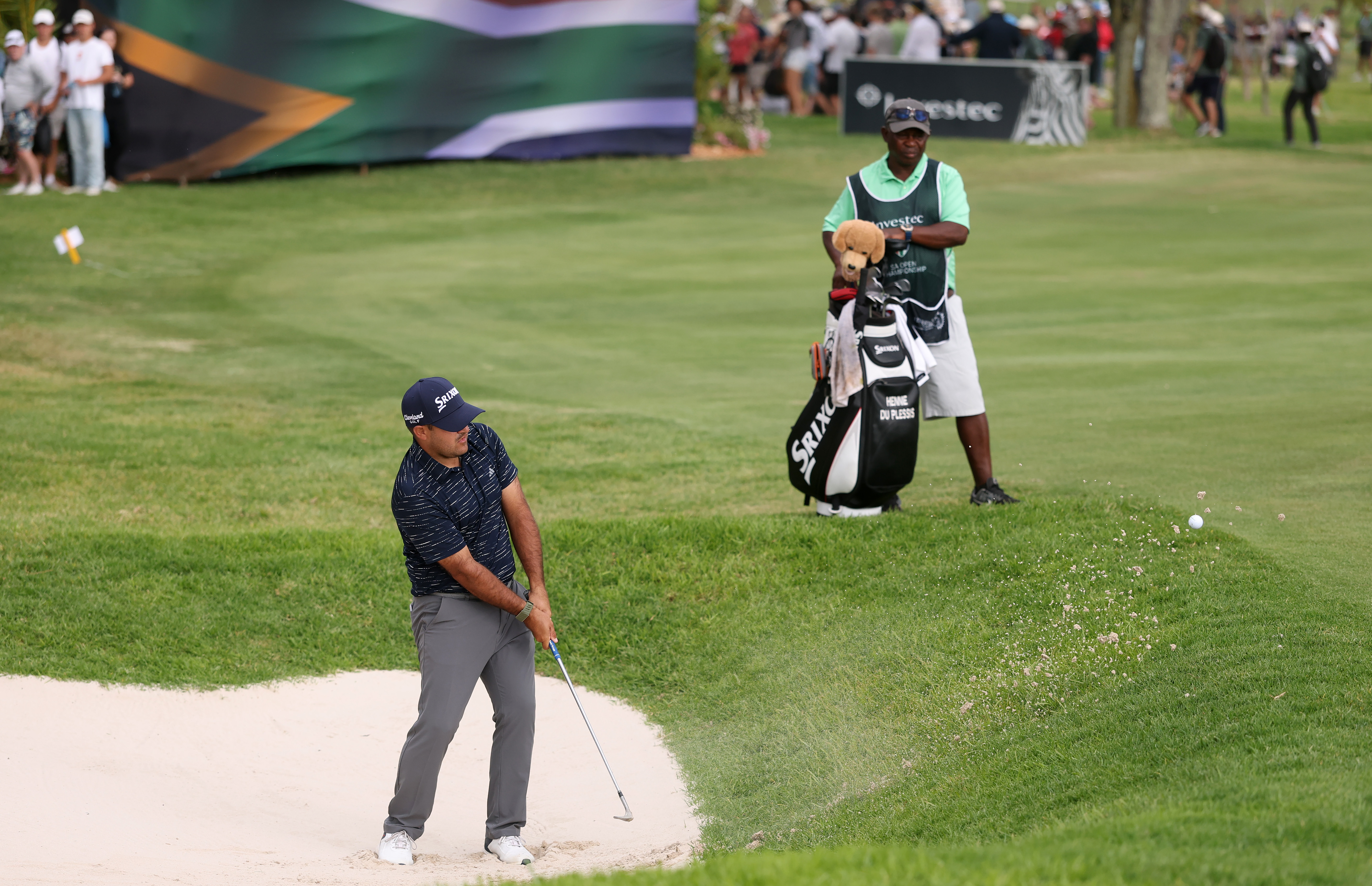 Hennie du Plessis chips onto the 18th green during the third round of the Investec South African Open Championship