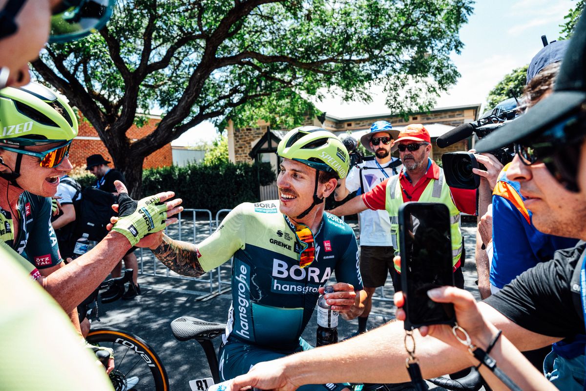 Sam Welsford (Bora-Hansgrohe) is congratulated by his new teammates on his victory on stage 1 of the Tour Down Under