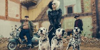 Emma Stone, Paul Walter Hauser, and Joel Fry in Cruella