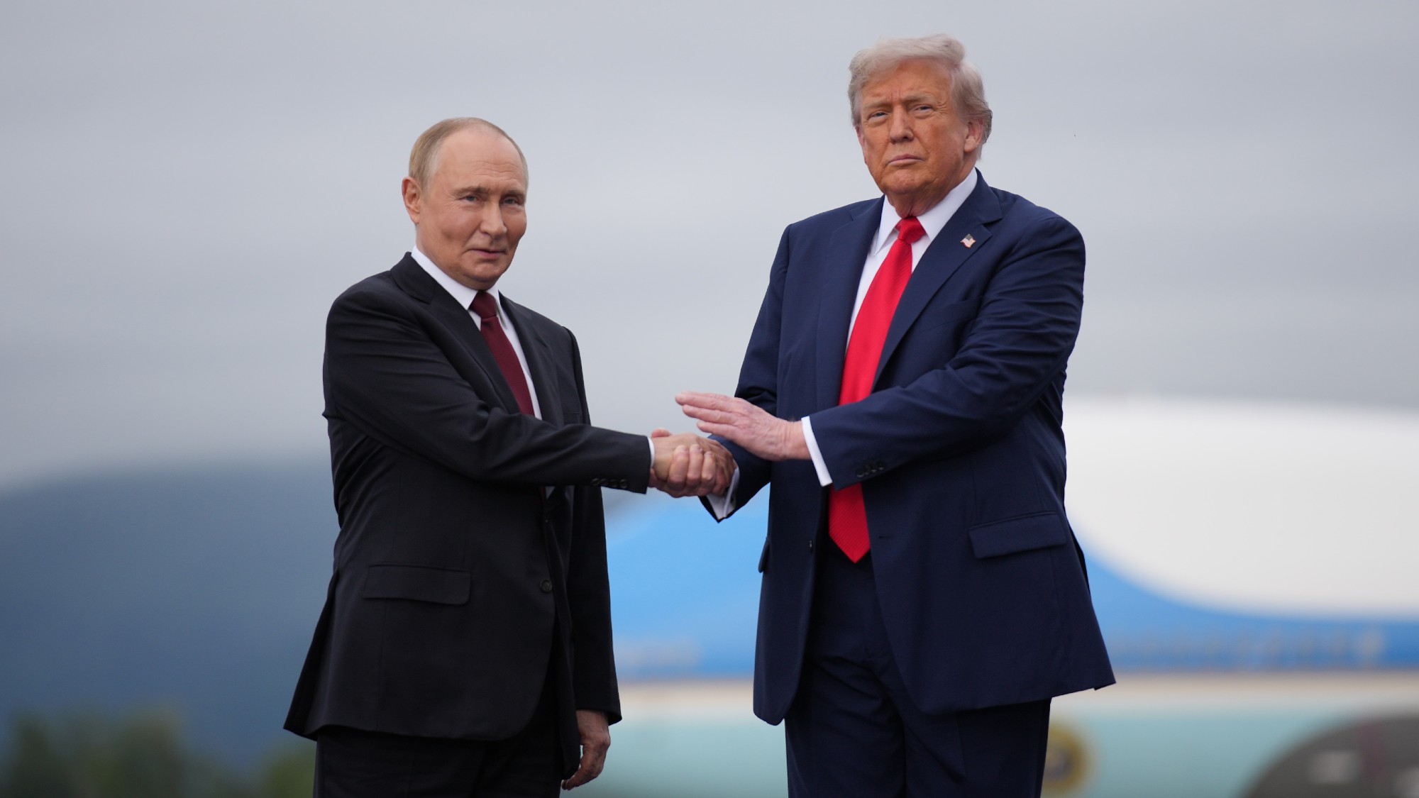 Vladimir Putin and Donald Trump shake hands at the Joint Base Elmendorf-Richardson in Anchorage, Alaska, in August 2025