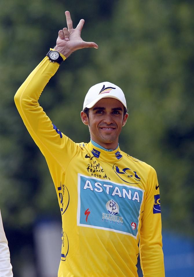 Alberto Contador counts up his soon to be subtracted three Tour de France victories after the 2010 Tour de France