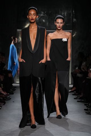 Vittoria Ceretti and Mona Tougaard walking in Haider Ackermann's first Tom Ford runway show during Paris Fashion Week.