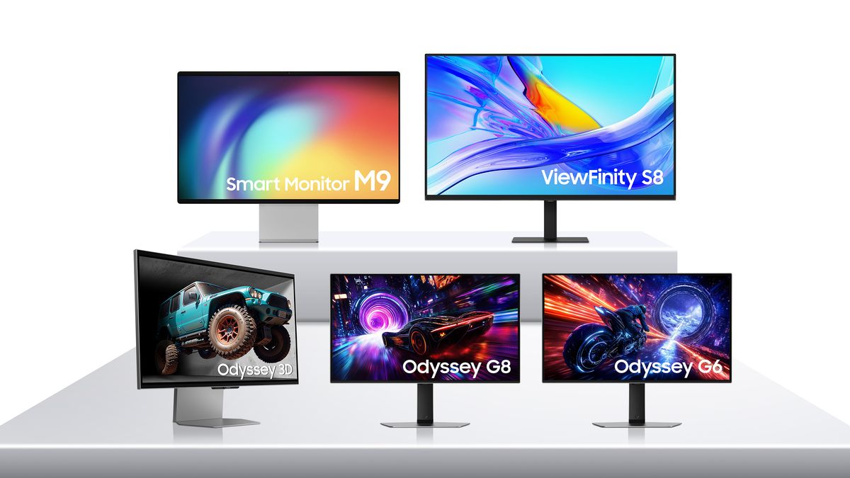 Five Samsung monitors displayed on a white table