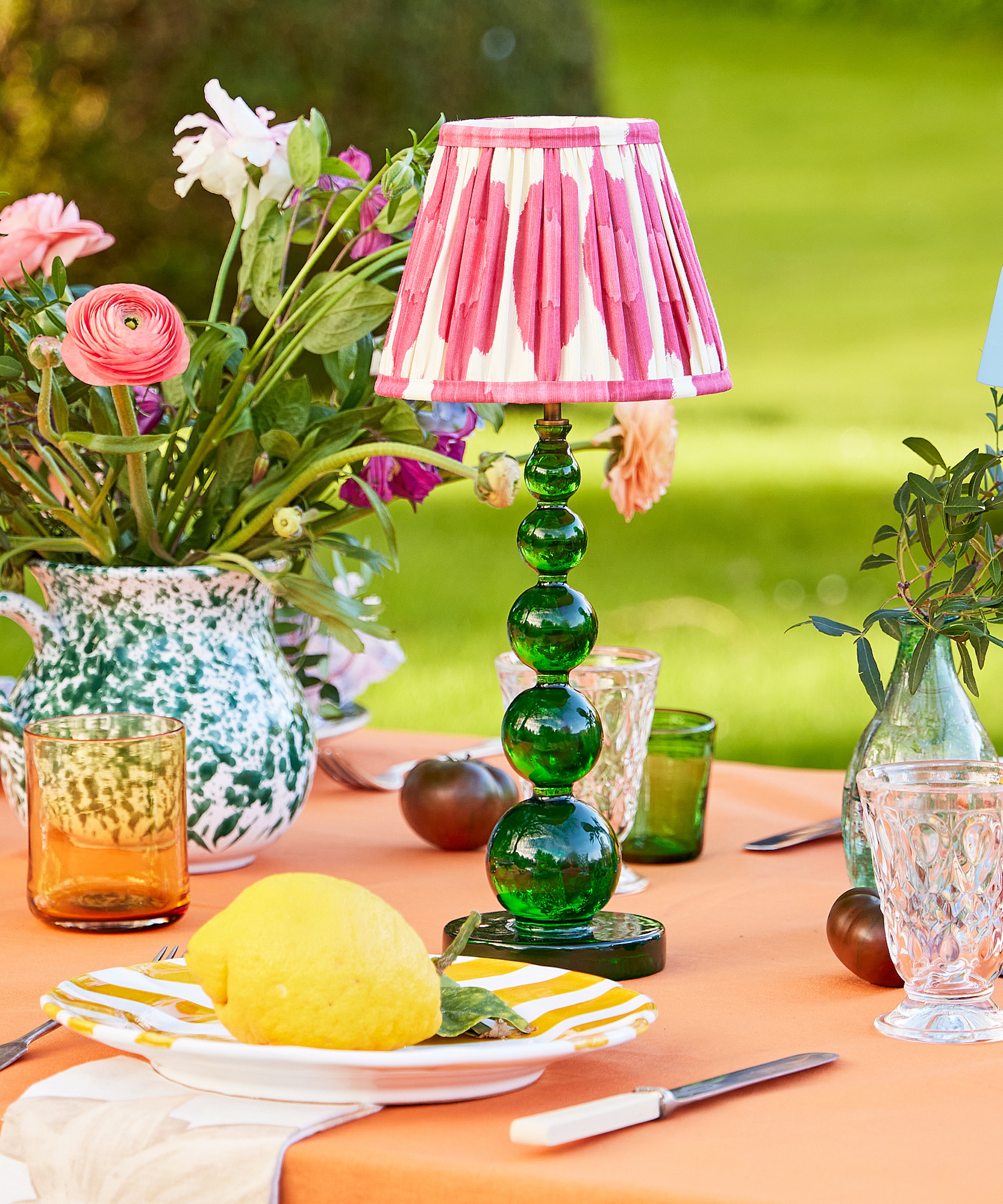 colourful garden table with striped lamp