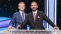 Ken Jennings stands with Brad Rutter on Jeopardy! Masters in 2025.