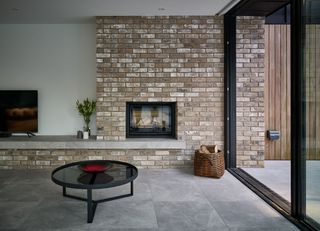 Brick wall and minimalist interiors at Gowland House