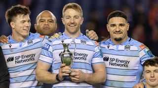 Glasgow Warriors celebrate with the trophy after winning the 1872 Cup in 2024/25.
