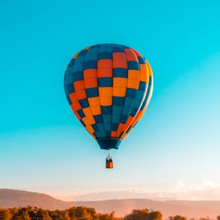 hot air balloon with a clear blue sky
