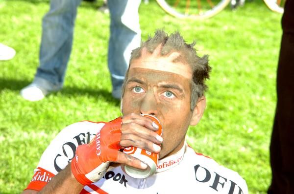 Kevin Ista (Cofidis) displays remarkable helmet hair and grime lines.